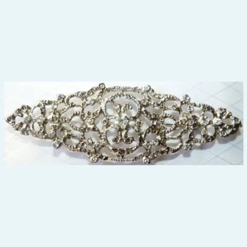 Broches mantilla